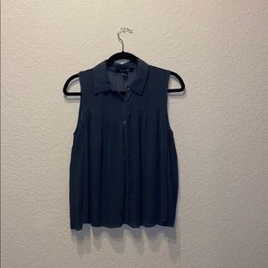 Collared, sleeveless top.